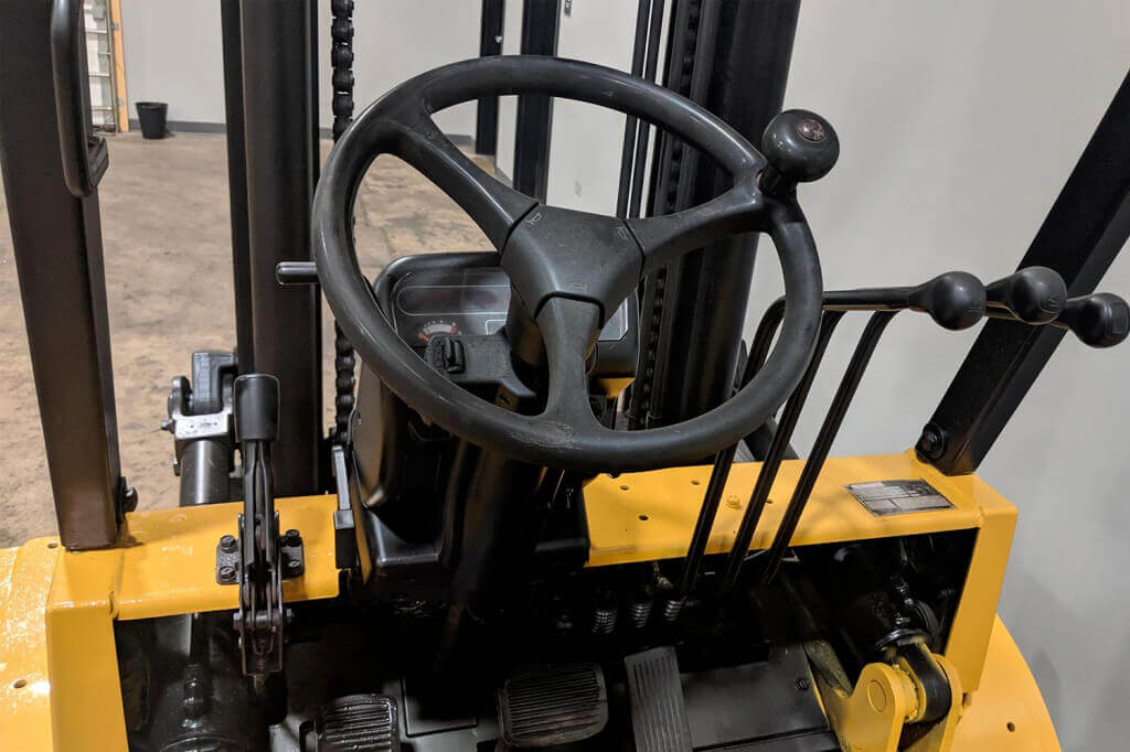 Виды рычагов управления погрузчиком